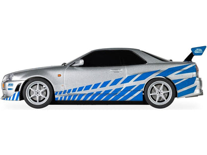 Fast and Furious Coffret 25 Ans Supra vs R34 Circuit Scalextric à l'échelle 1:32
